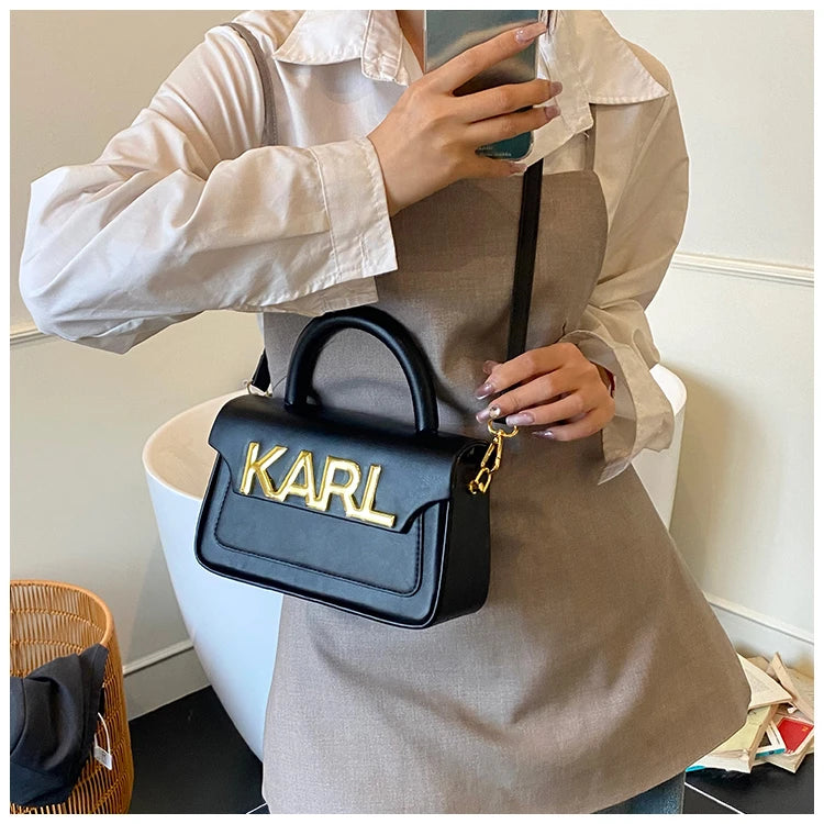 Sac à couches haut de gamme tendance avec une finition soignée et des couleurs assorties à la mode, répondant à l'esthétique des mères modernes
