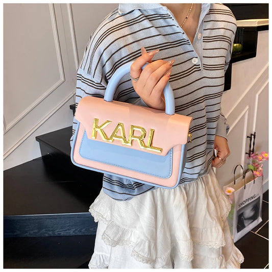 Sac à couches haut de gamme tendance avec une finition soignée et des couleurs assorties à la mode, répondant à l'esthétique des mères modernes