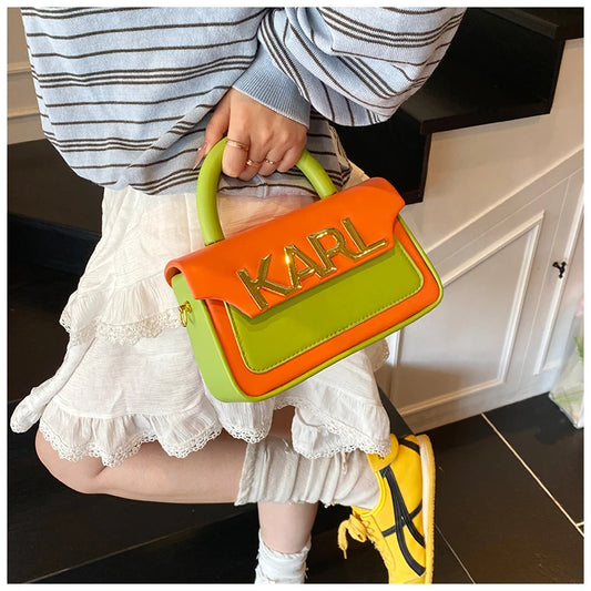 Sac à couches haut de gamme tendance avec une finition soignée et des couleurs assorties à la mode, répondant à l'esthétique des mères modernes